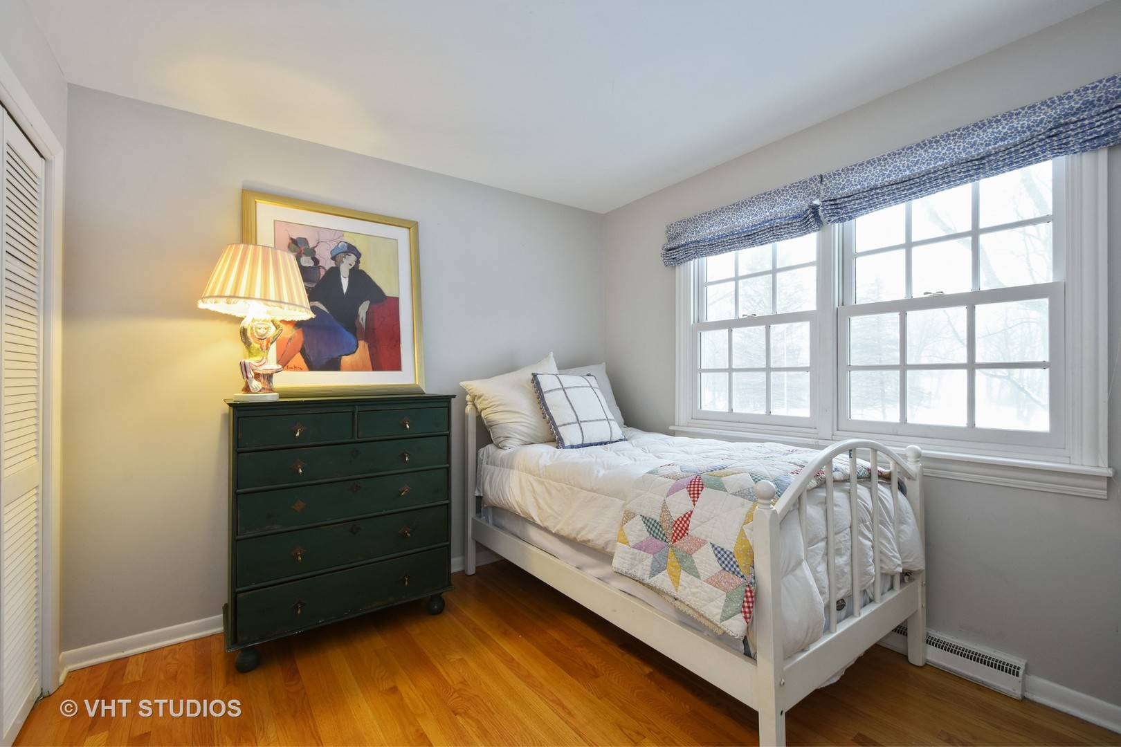 1719 Spring Creek Road Barrington Hills, IL 60010 - Photo 22 of 26 a bedroom with a bed and a window