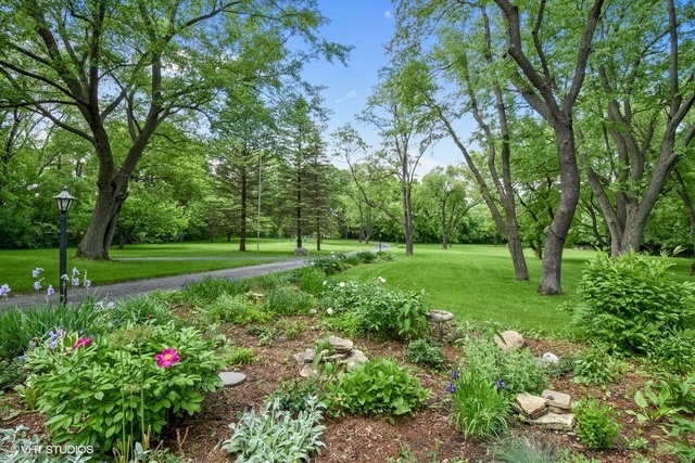 1719 Spring Creek Road Barrington Hills, IL 60010 - Photo 8 of 26 a view of a park with large trees