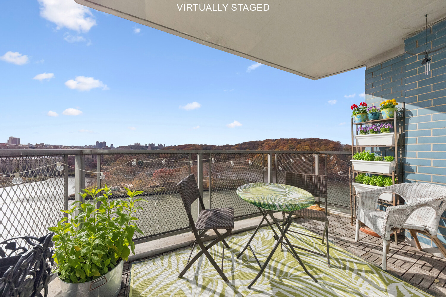 2400 Johnson Avenue, Unit 5F Bronx, NY 10463 - Photo 6 of 14 a view of a chairs and table in patio