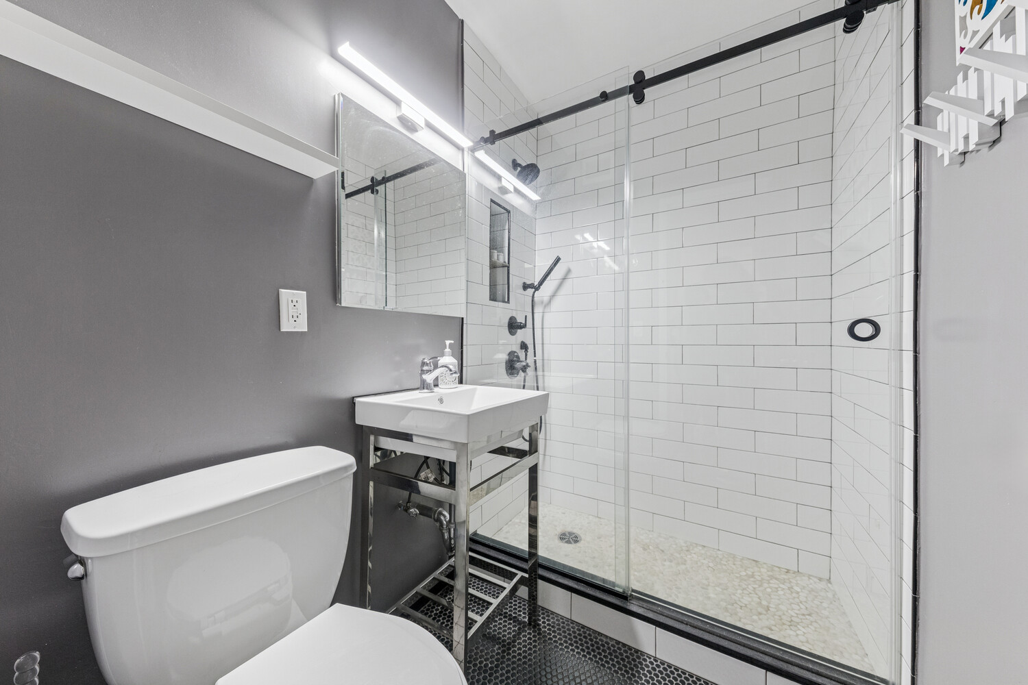 2400 Johnson Avenue, Unit 5F Bronx, NY 10463 - Photo 9 of 14 a white toilet sitting next to a bathroom sink