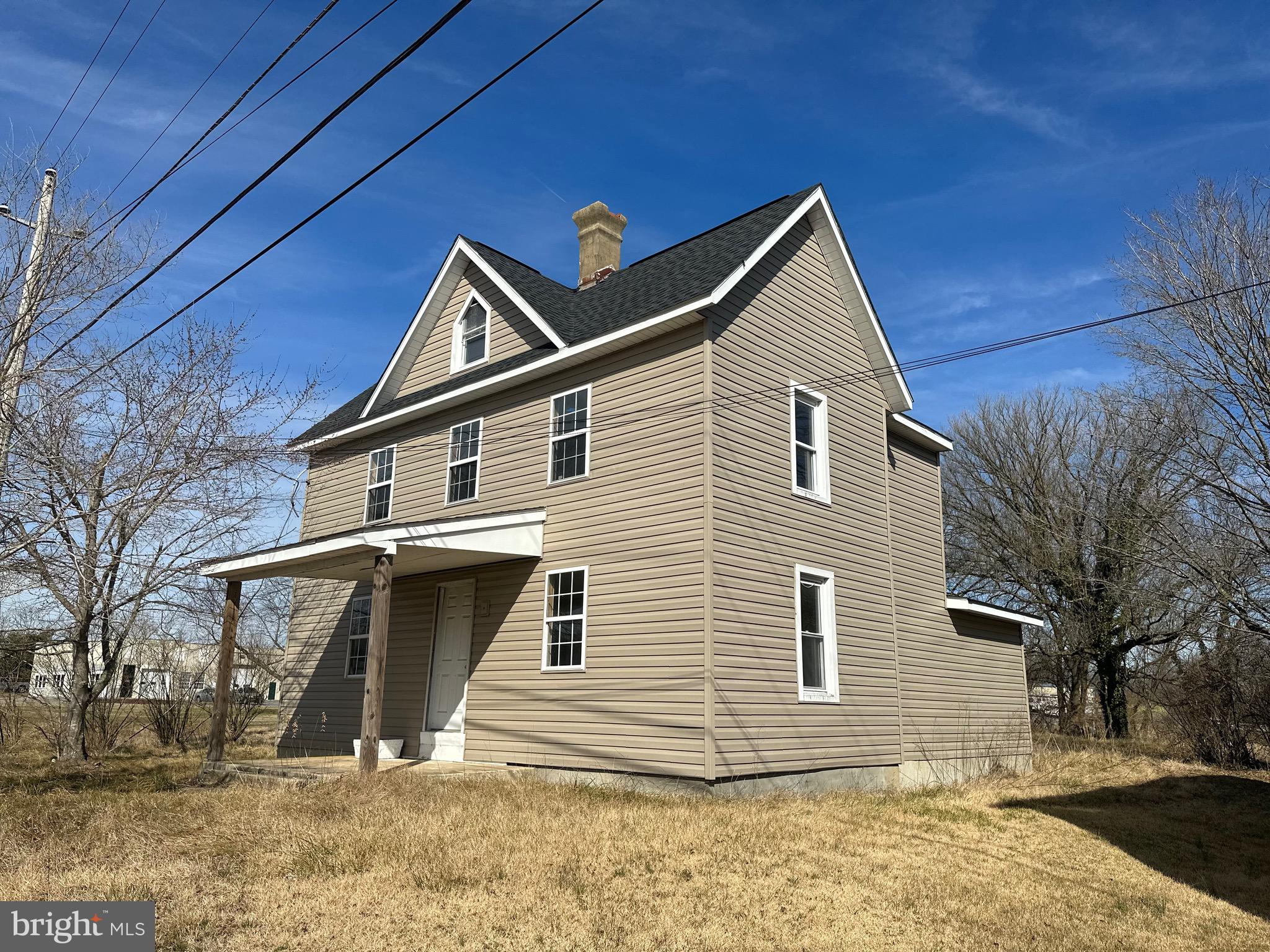 24872 Meeting House Road Denton, MD 21629 - Photo 12 of 73 a view of a house with a yard
