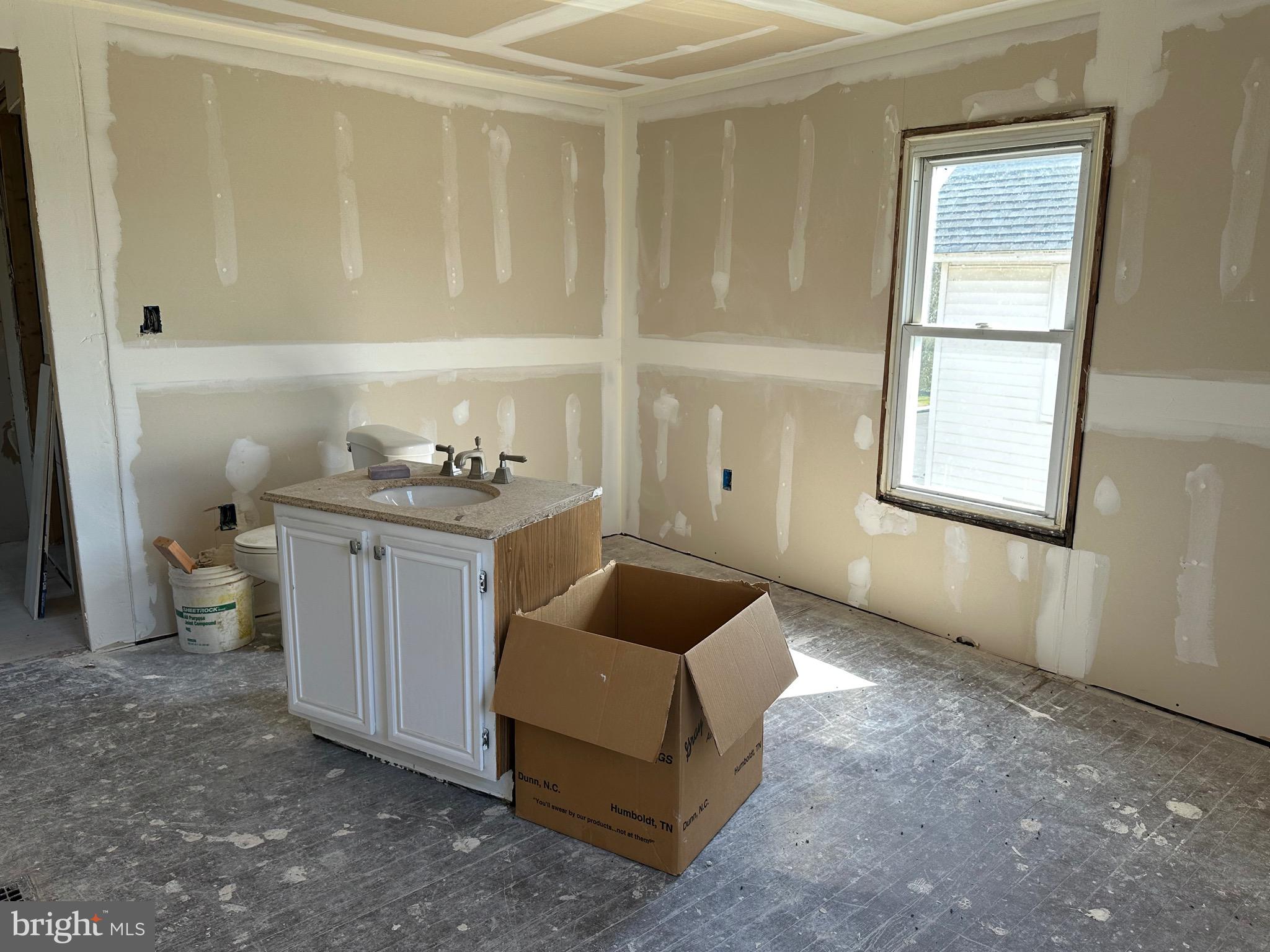 24872 Meeting House Road Denton, MD 21629 - Photo 24 of 73 a room with a window and a couch