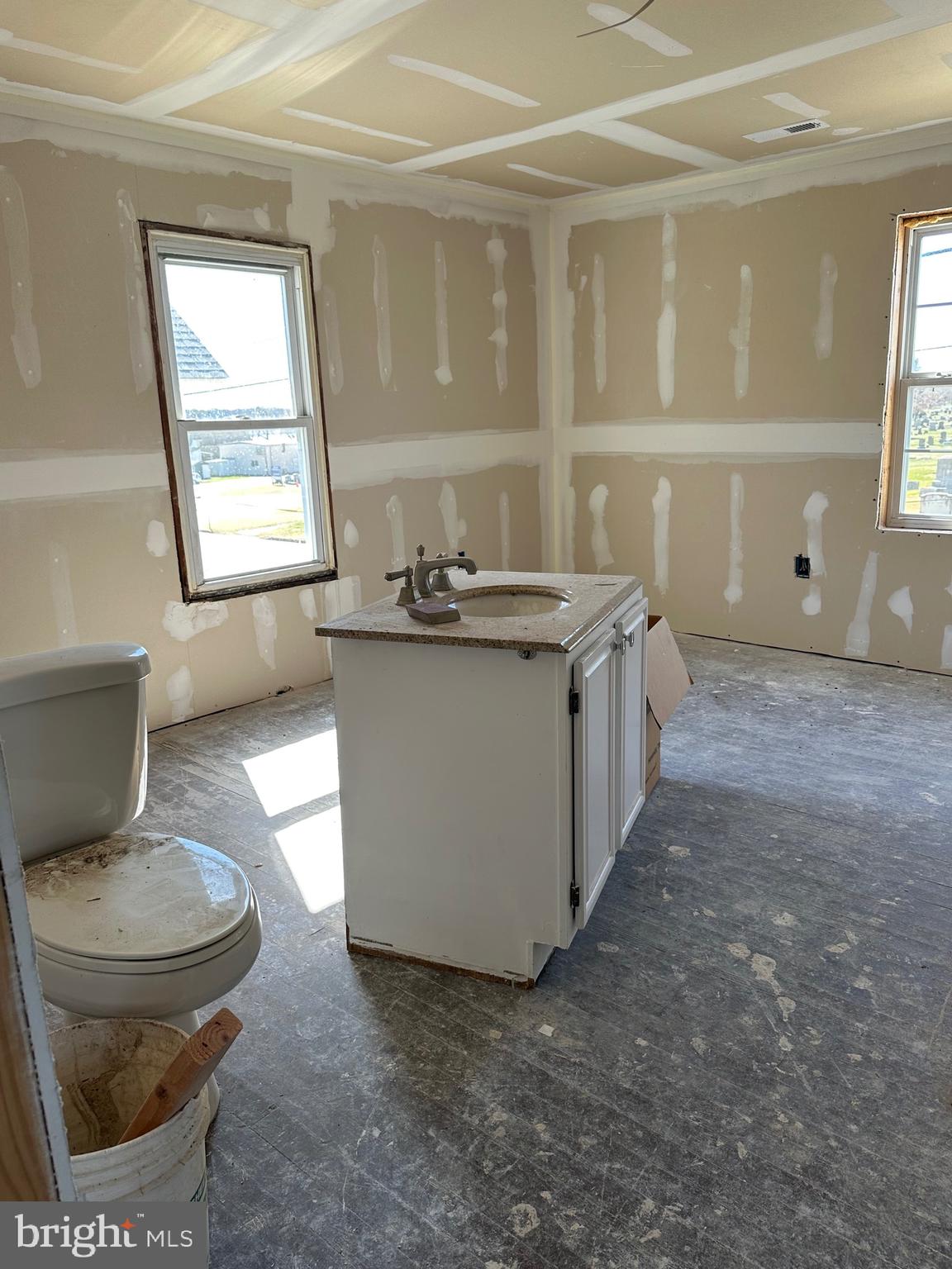 24872 Meeting House Road Denton, MD 21629 - Photo 26 of 73 a living room with a couch and a table