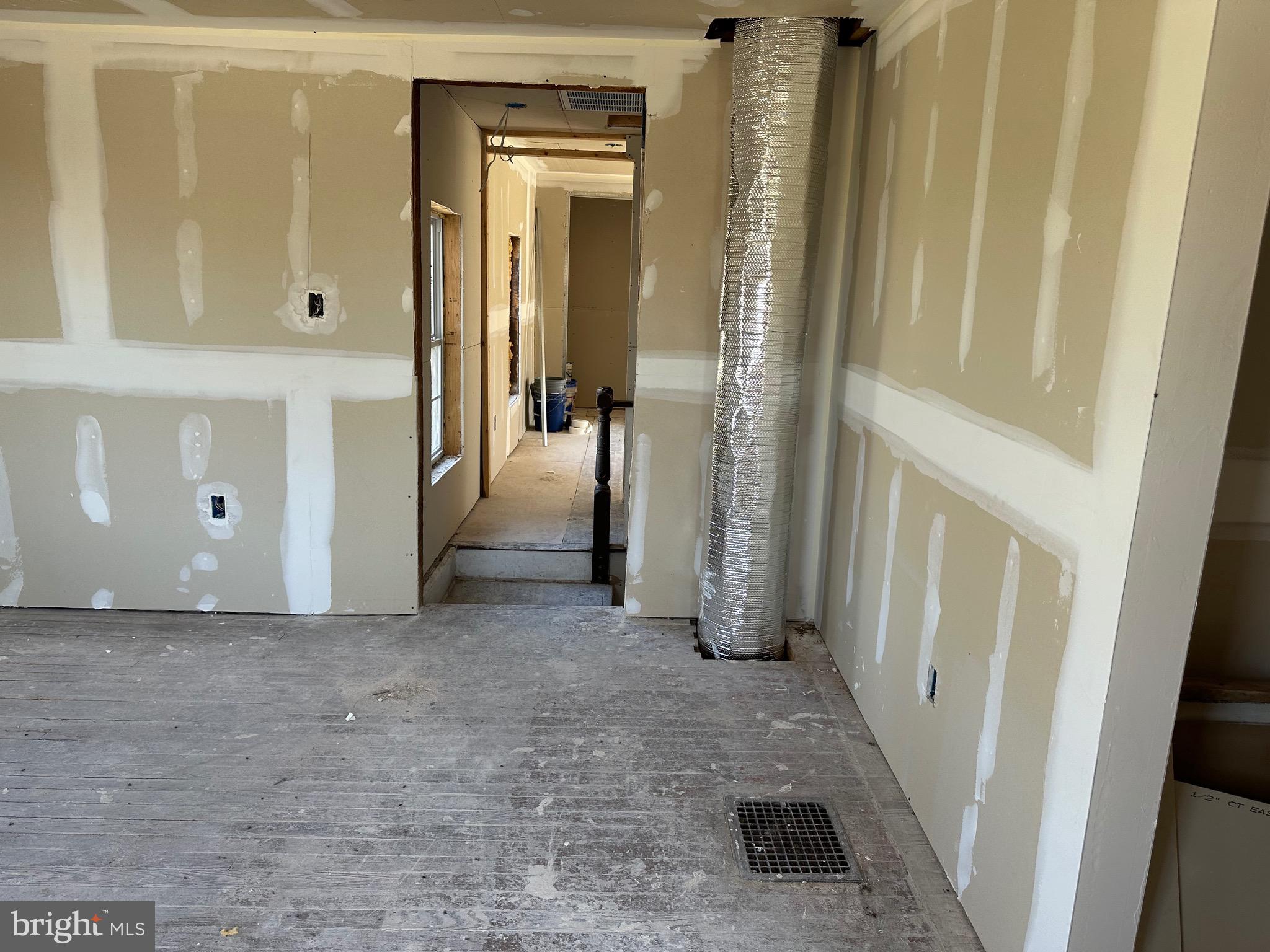 24872 Meeting House Road Denton, MD 21629 - Photo 38 of 73 a view of a hallway with a livingroom and furniture