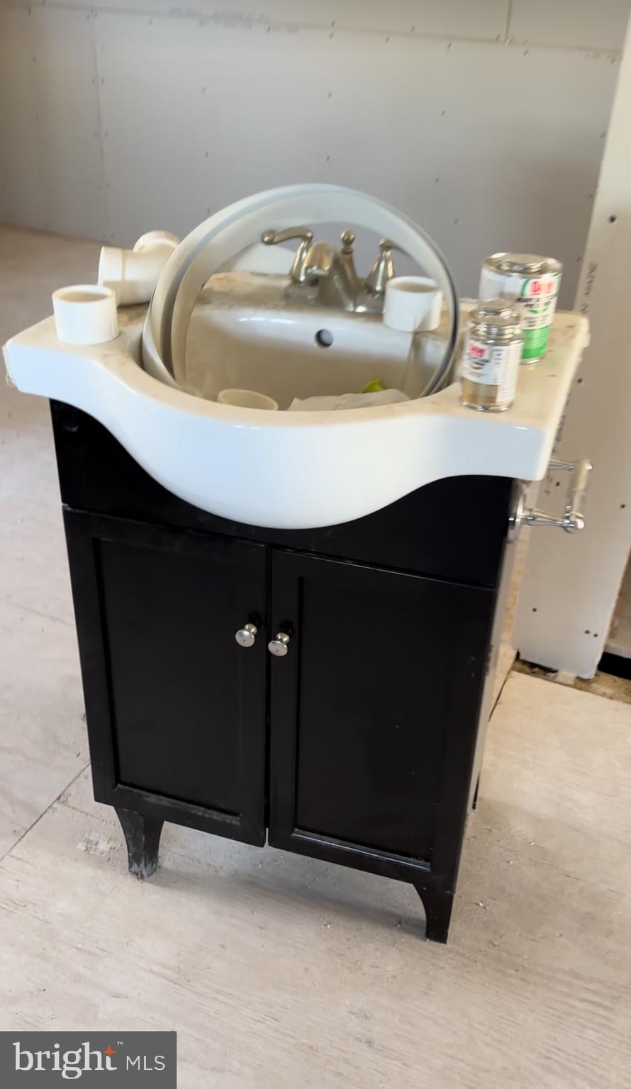 24872 Meeting House Road Denton, MD 21629 - Photo 5 of 73 a bathroom with a sink and a mirror