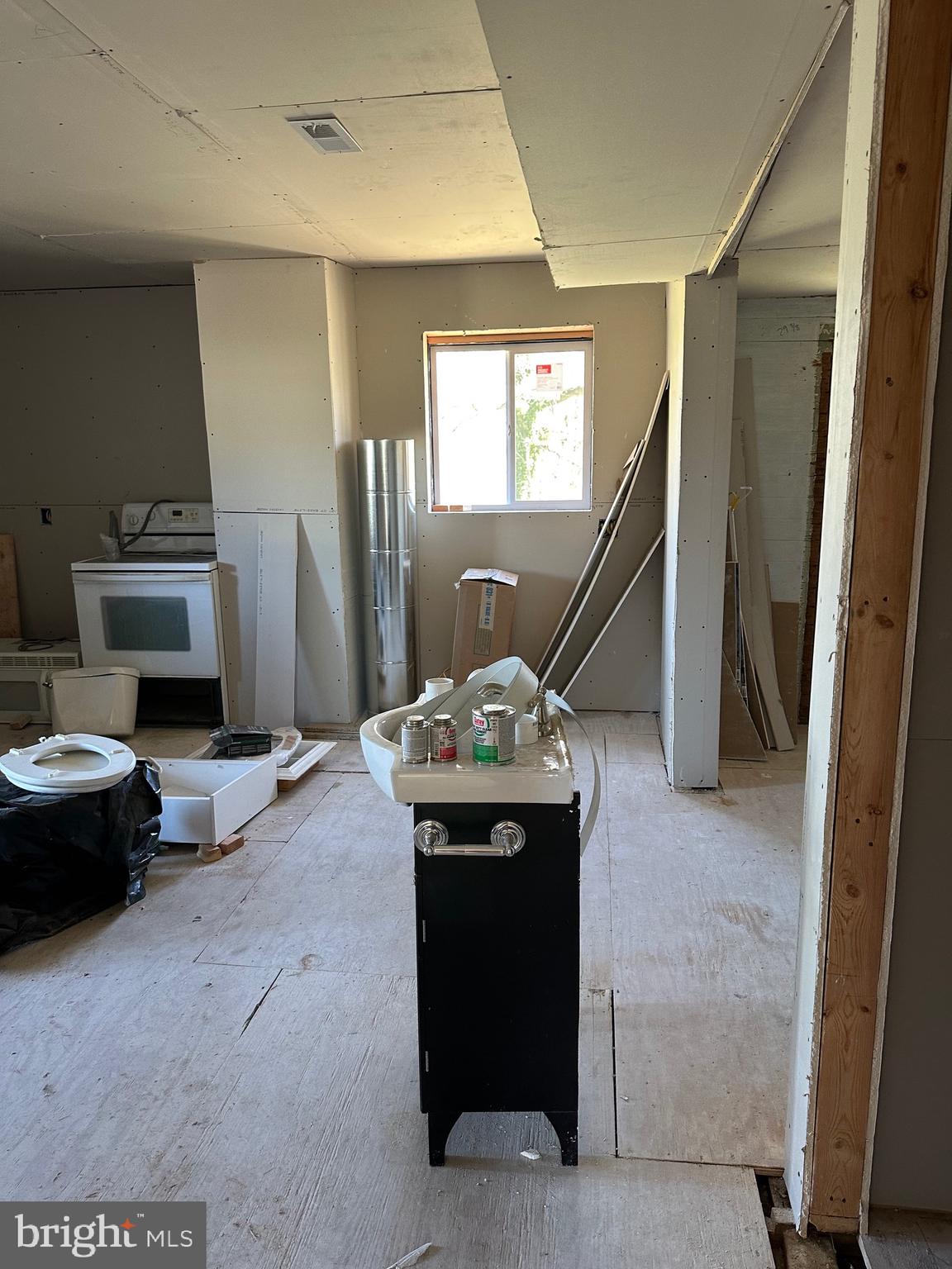 24872 Meeting House Road Denton, MD 21629 - Photo 51 of 73 a living room with furniture and a flat screen tv