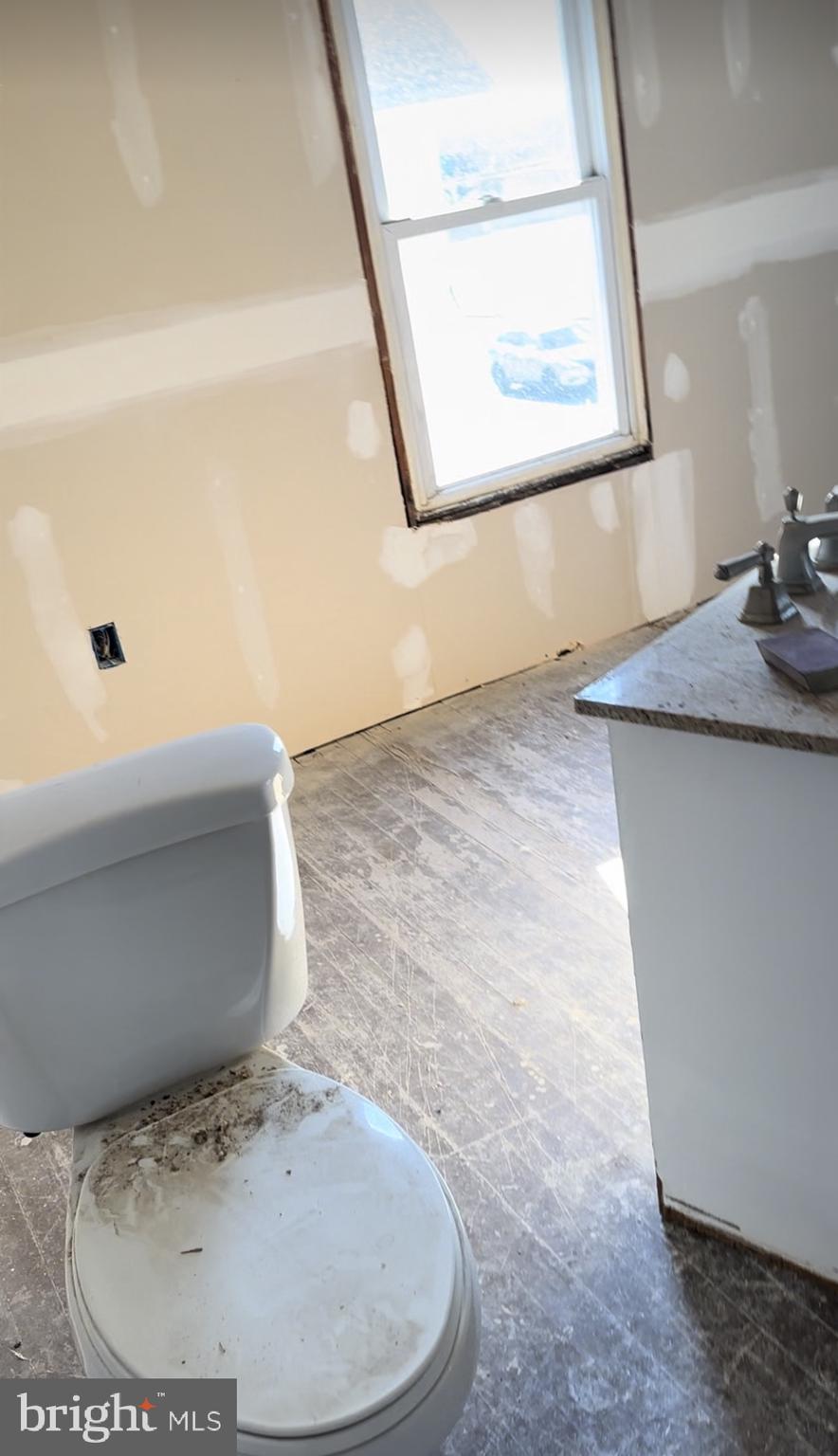 24872 Meeting House Road Denton, MD 21629 - Photo 9 of 73 a bathroom with a sink and a mirror