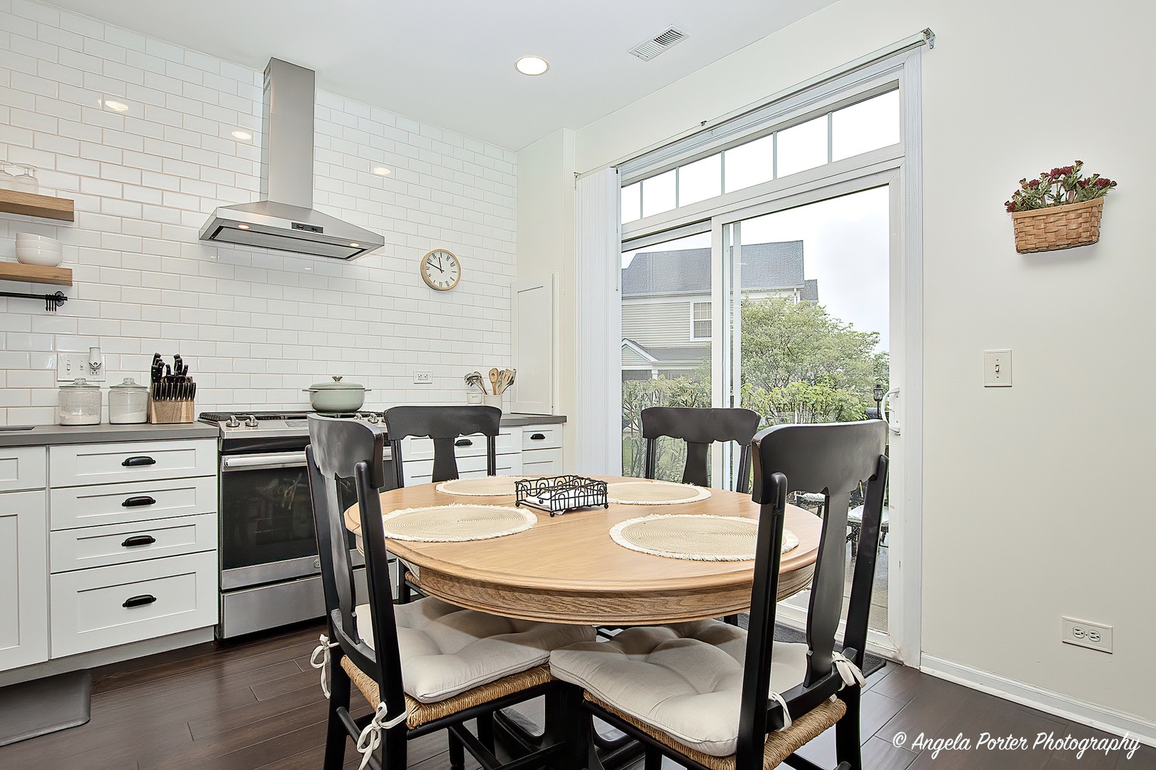 2624 Evergreen Circle McHenry, IL 60050 - Photo 8 of 18 a view of a dining room with furniture window and wooden floor
