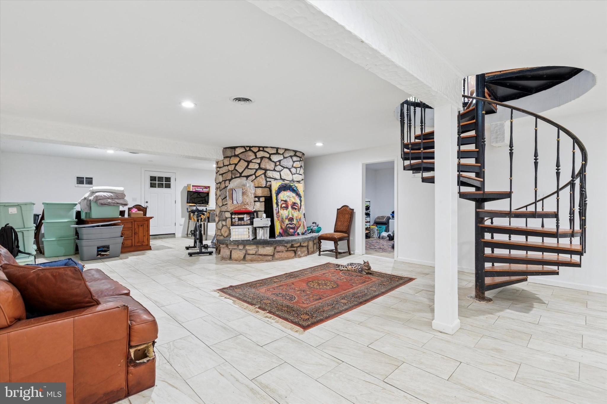 290 Hatboro Road Ivyland, PA 18974 - Photo 19 of 45 a living room with furniture a wooden floor and next to a window
