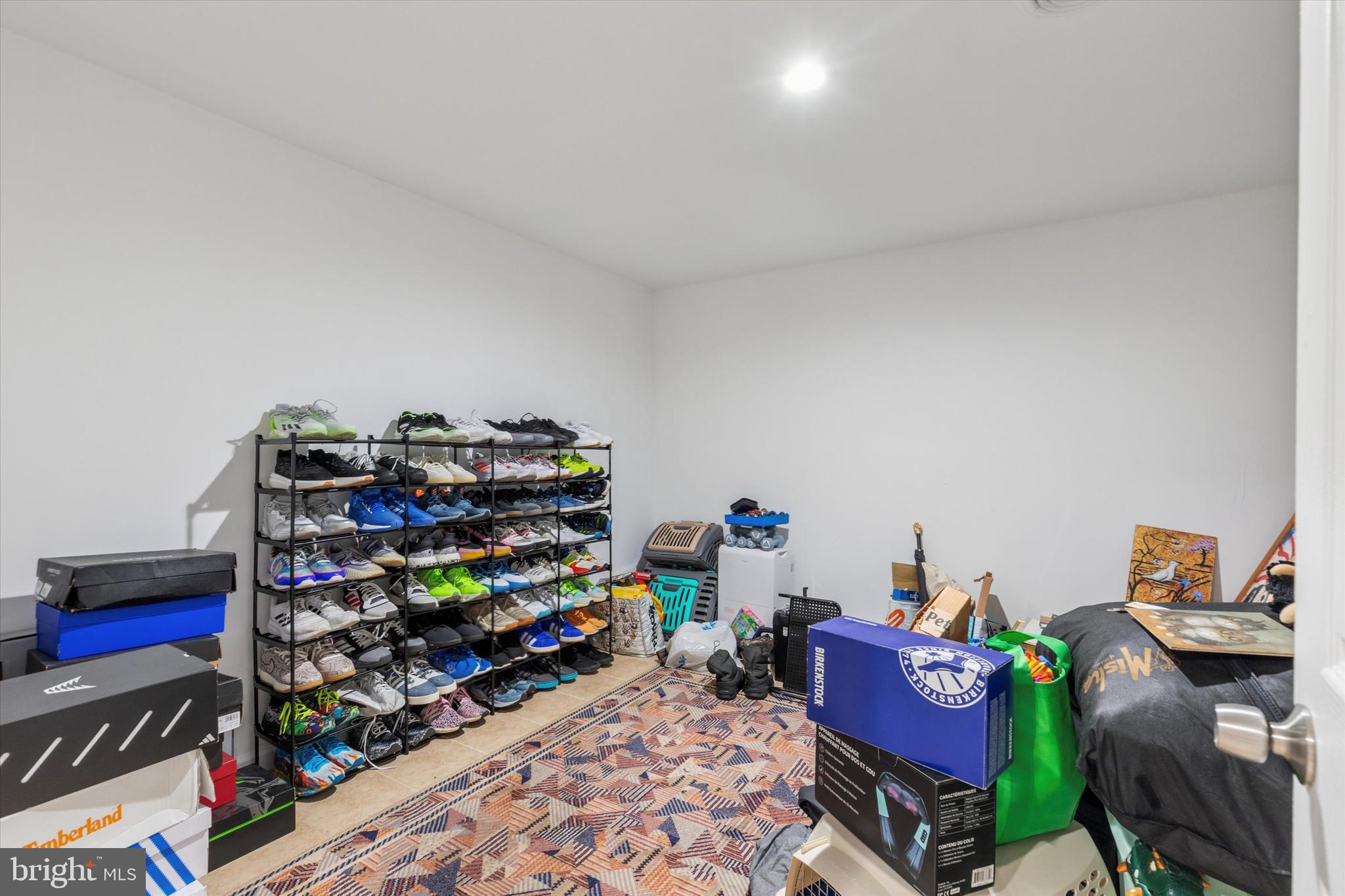 290 Hatboro Road Ivyland, PA 18974 - Photo 25 of 45 a living room with lots of baby toys and wooden floor
