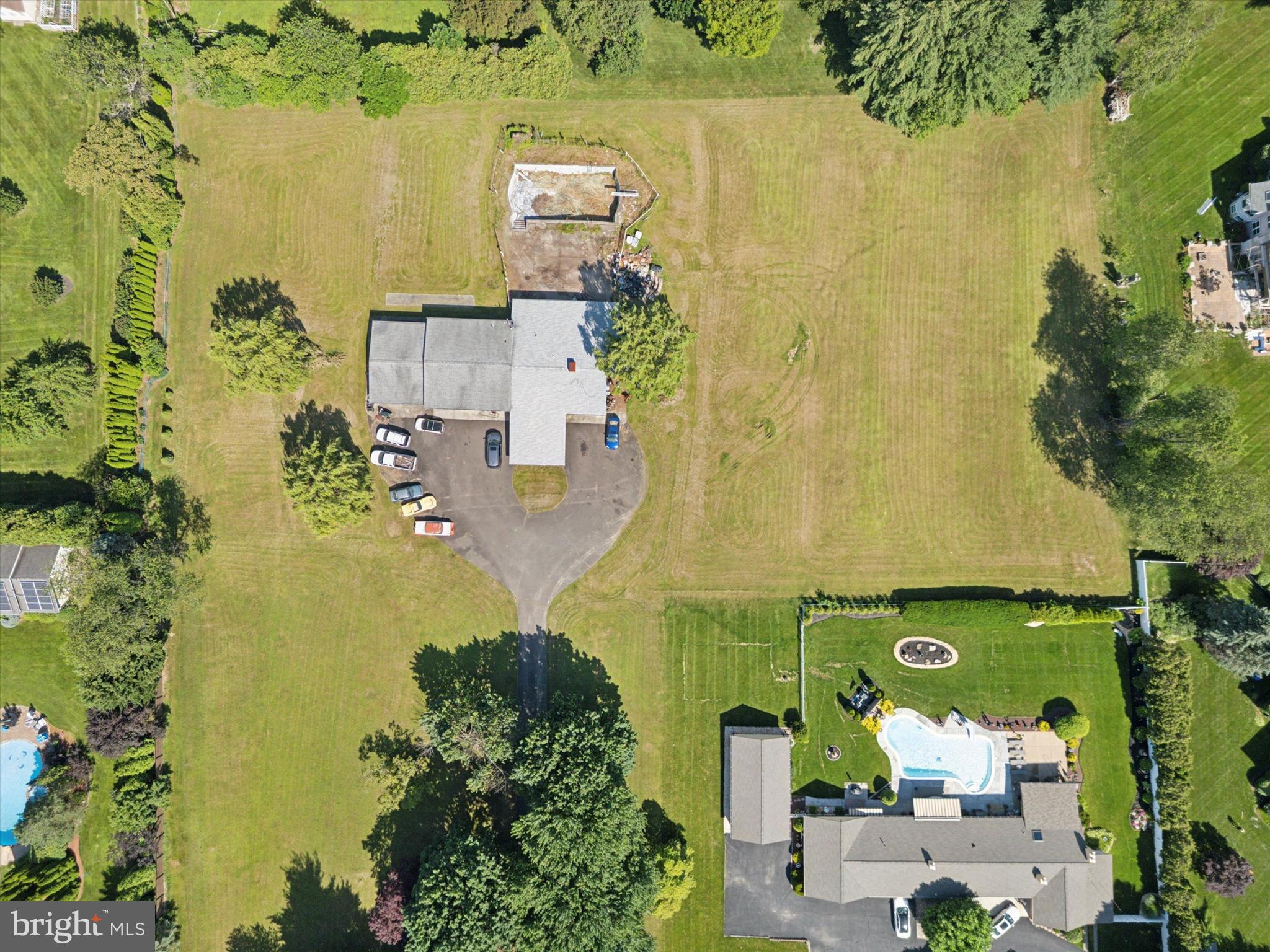 290 Hatboro Road Ivyland, PA 18974 - Photo 32 of 45 an aerial view of a residential building with garden space and swimming pool