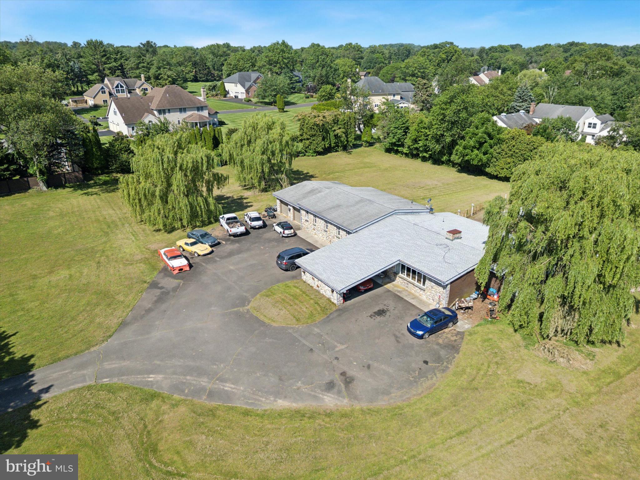 290 Hatboro Road Ivyland, PA 18974 - Photo 33 of 45 an aerial view of a swimming pool with a yard