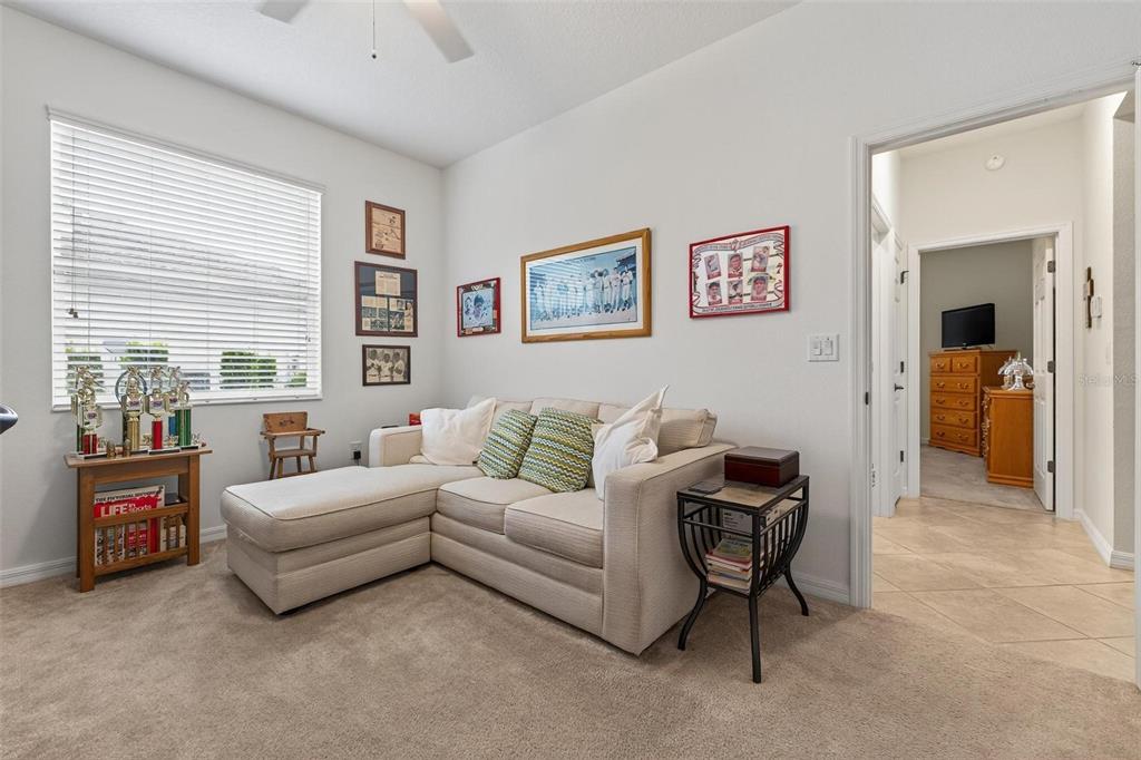 8336 Southwest 77th Court Ocala, FL 34476 - Photo 17 of 47 a living room with furniture and a window
