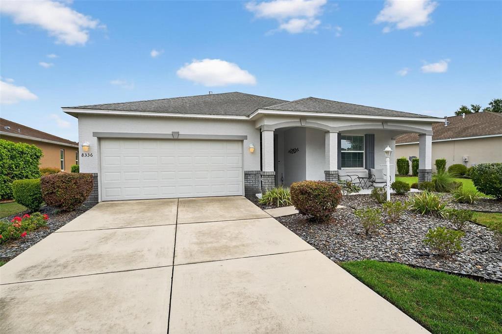8336 Southwest 77th Court Ocala, FL 34476 - Photo 2 of 47 a view of a back yard of the house