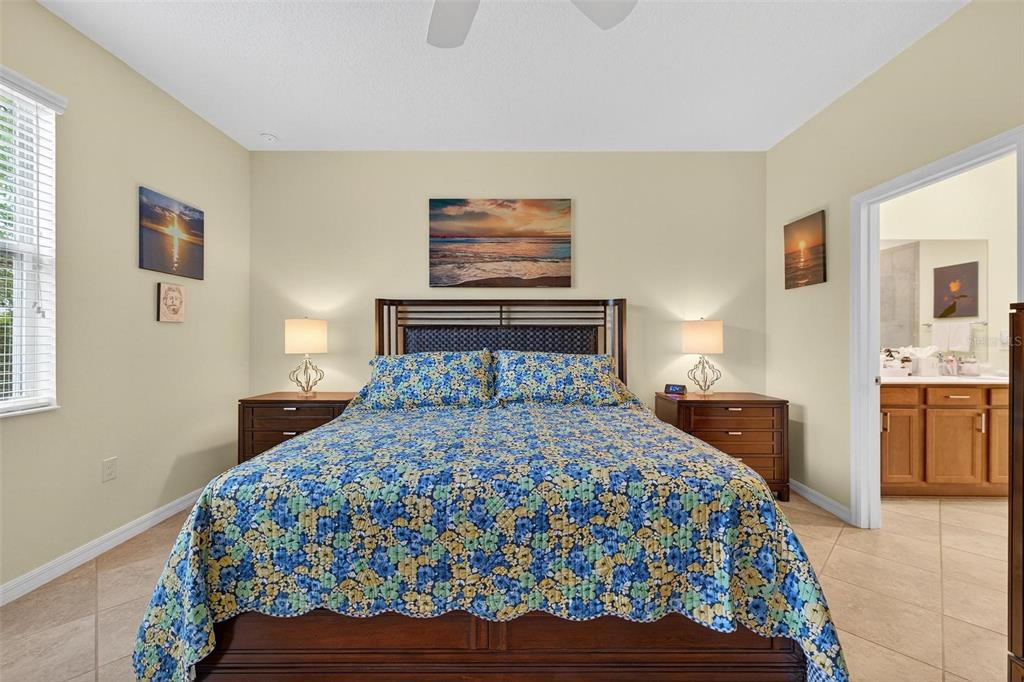 8336 Southwest 77th Court Ocala, FL 34476 - Photo 22 of 47 a bedroom with a bed and wooden floor