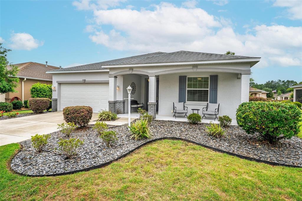 8336 Southwest 77th Court Ocala, FL 34476 - Photo 3 of 47 a view of a house with backyard and sitting area
