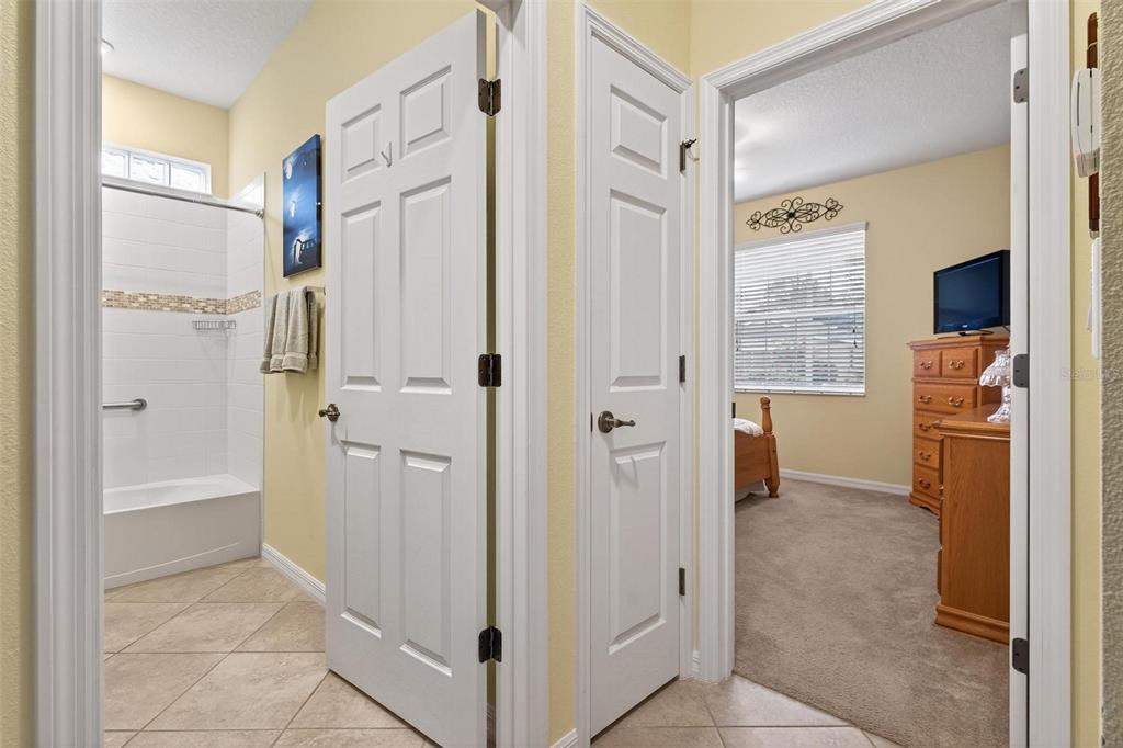 8336 Southwest 77th Court Ocala, FL 34476 - Photo 8 of 47 a view of walk in closet with white walls