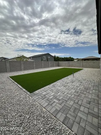 a view of a terrace with a big yard