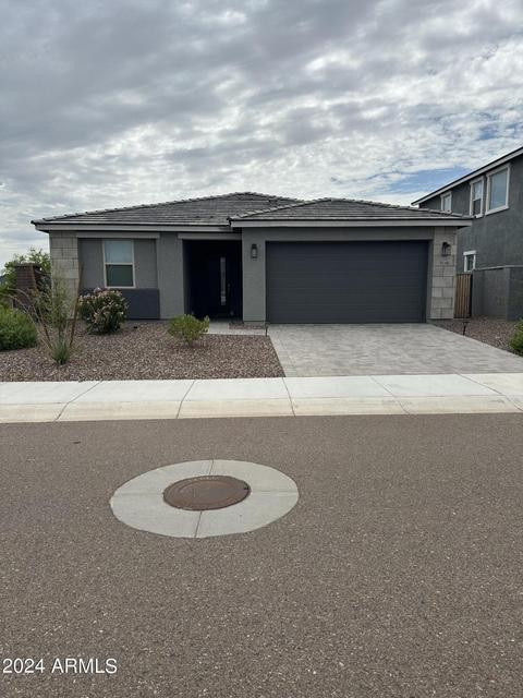 13209 West Roy Rogers Road Peoria, AZ 85383 - Photo 2 of 22 a view of garage with yard