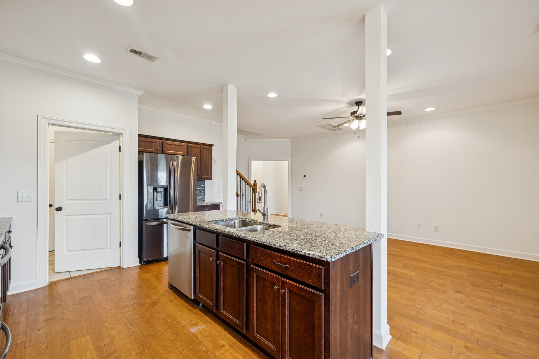 2912 Butterfly Bend Murfreesboro, TN 37129 - Photo 23 of 48 a kitchen with stainless steel appliances granite countertop a sink and a refrigerator