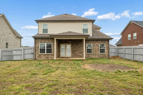 a house with yard in front of it