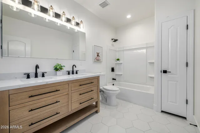 a view of a swimming pool with a yard