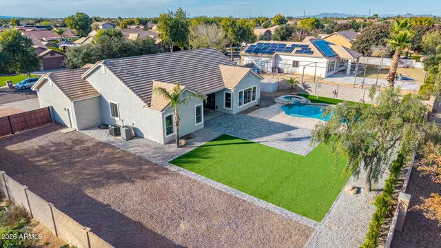 a view of backyard and tree