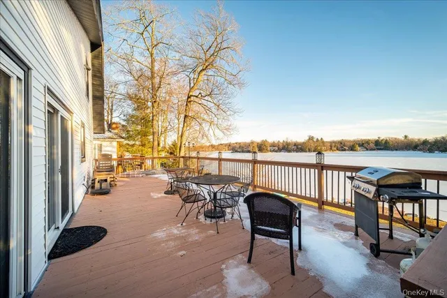 a view of a balcony with chairs