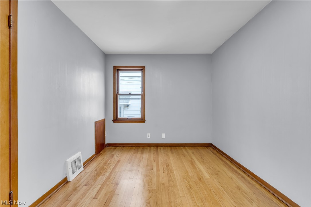 5384 Turney Road Cleveland, OH 44125 - Photo 15 of 27 Unfurnished room with light wood-type flooring