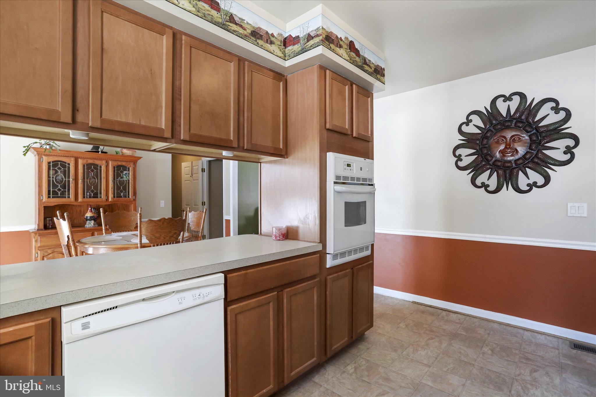 444 Castleton Ford Road Castleton, VA 22716 - Photo 11 of 64 a kitchen with stainless steel appliances granite countertop a sink and a microwave