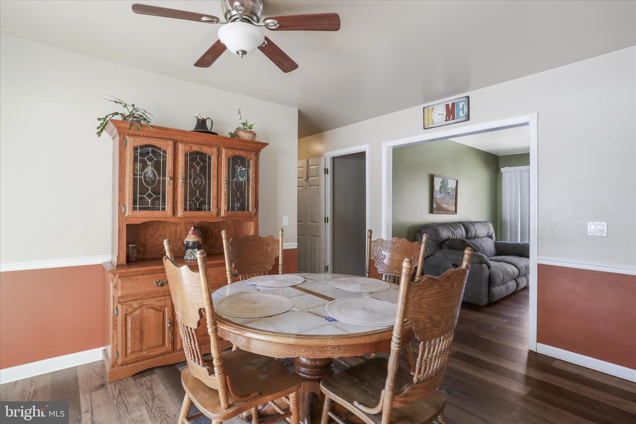 444 Castleton Ford Road Castleton, VA 22716 - Photo 15 of 64 a view of a dining room with furniture and wooden floor