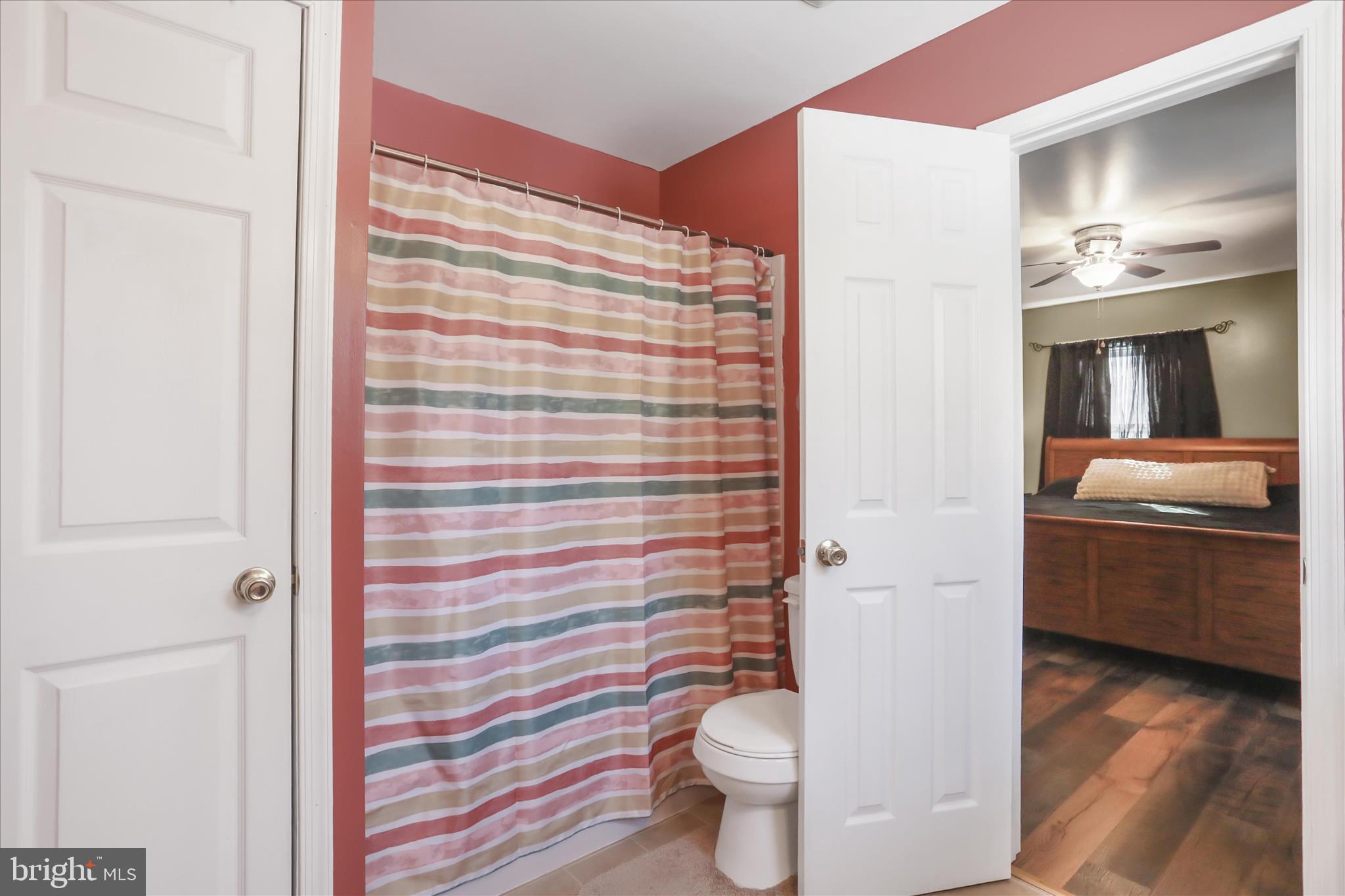 444 Castleton Ford Road Castleton, VA 22716 - Photo 27 of 64 a bathroom with a granite countertop sink toilet and shower
