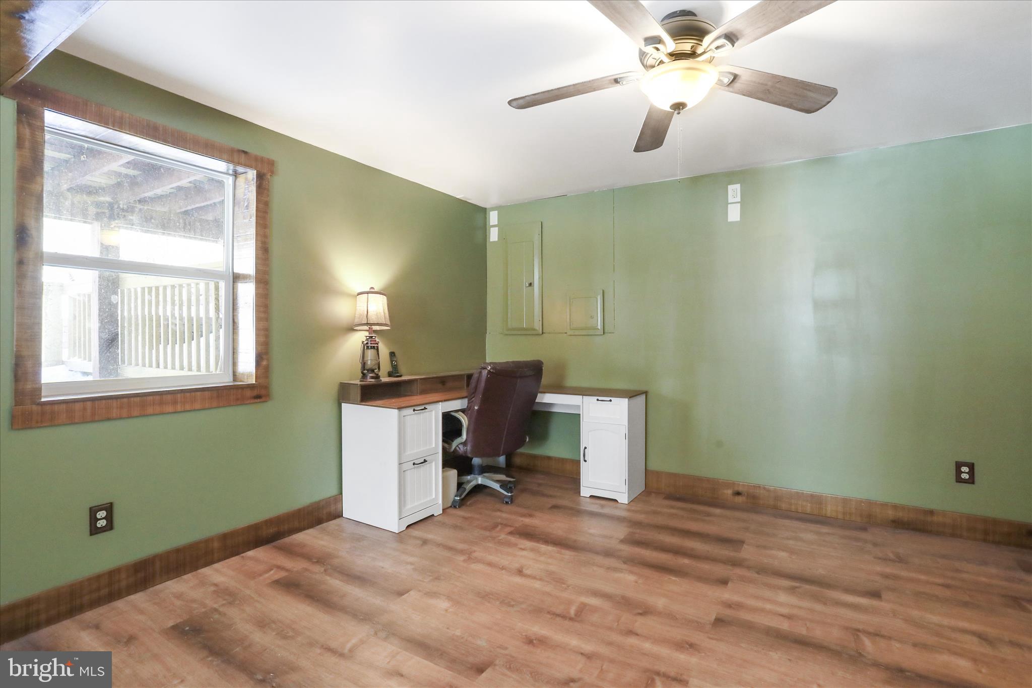 444 Castleton Ford Road Castleton, VA 22716 - Photo 35 of 64 a view of a room with a workspace