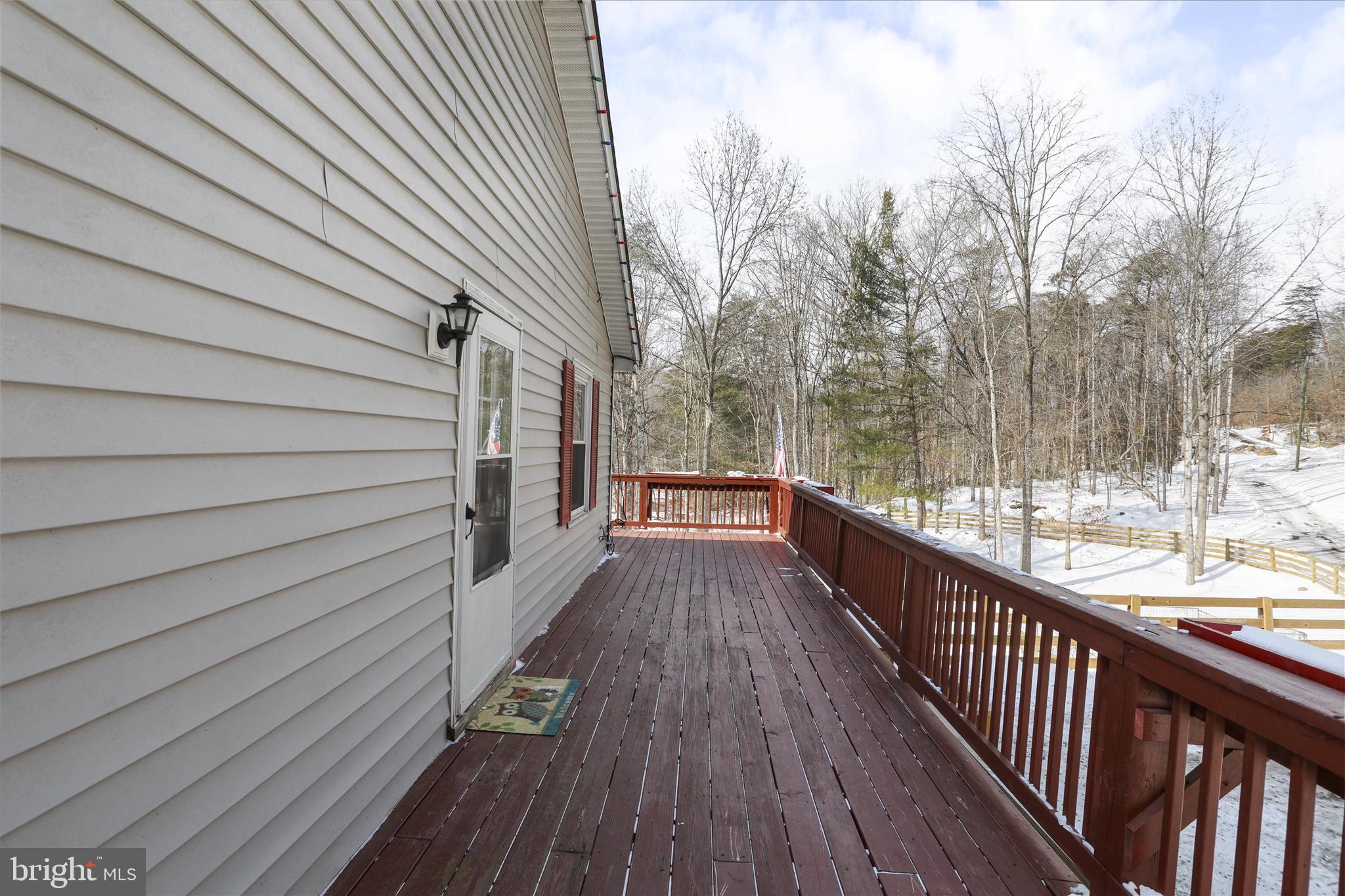 444 Castleton Ford Road Castleton, VA 22716 - Photo 44 of 64 a view of a balcony with wooden floor and floor