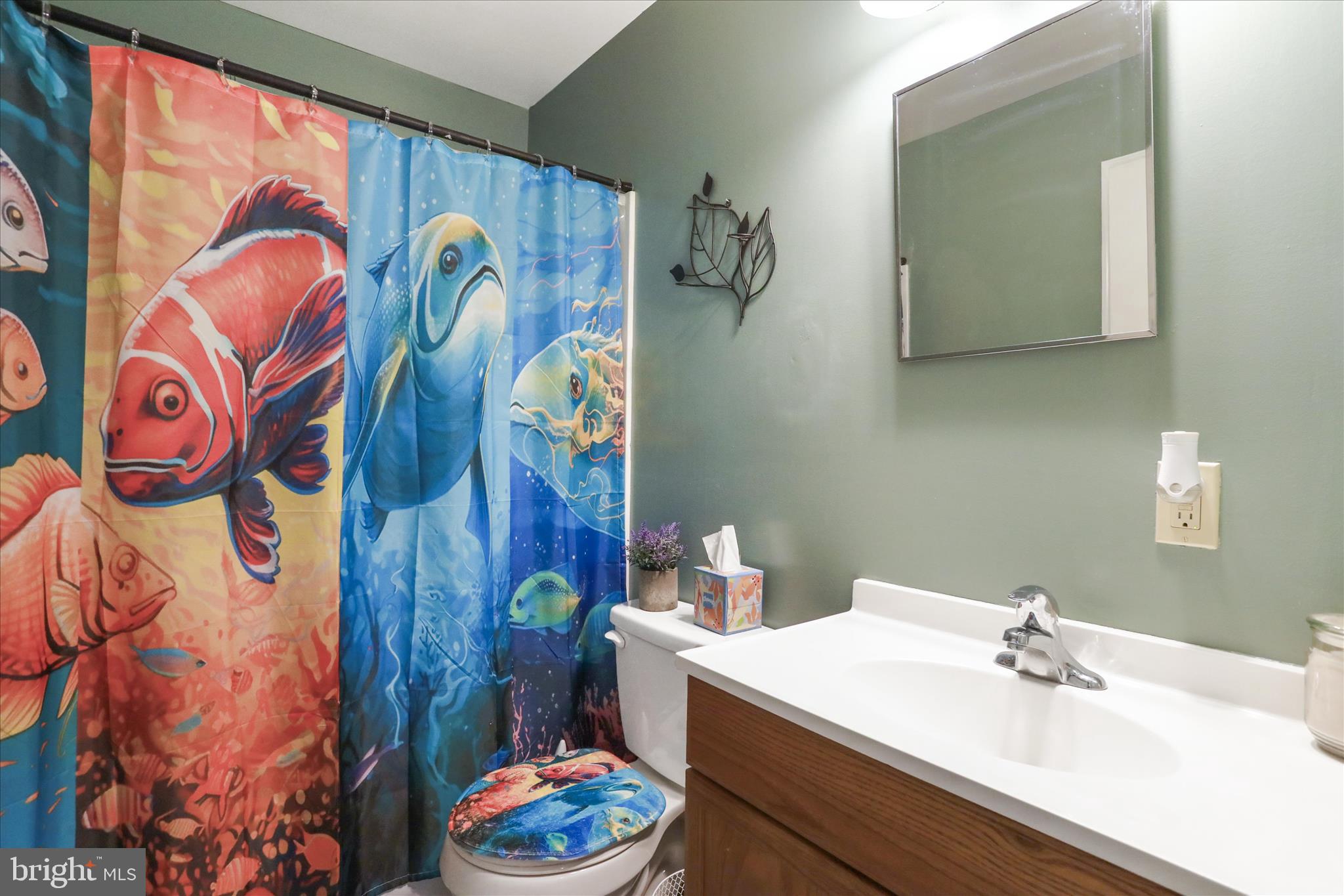 444 Castleton Ford Road Castleton, VA 22716 - Photo 45 of 64 a bathroom with a sink and a mirror