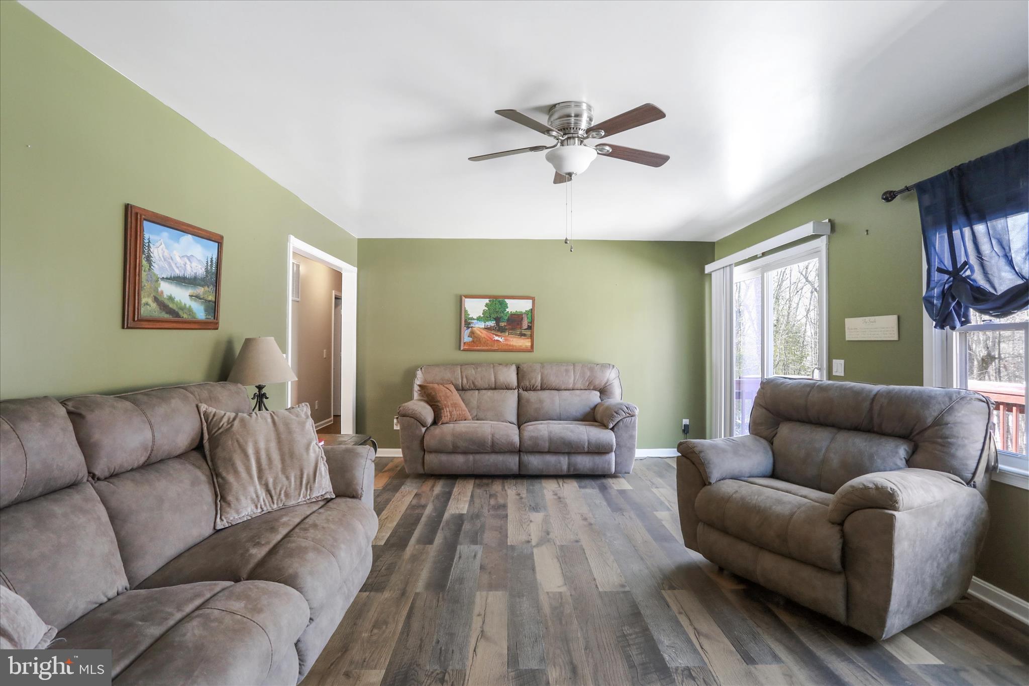 444 Castleton Ford Road Castleton, VA 22716 - Photo 6 of 64 a living room with furniture and a window