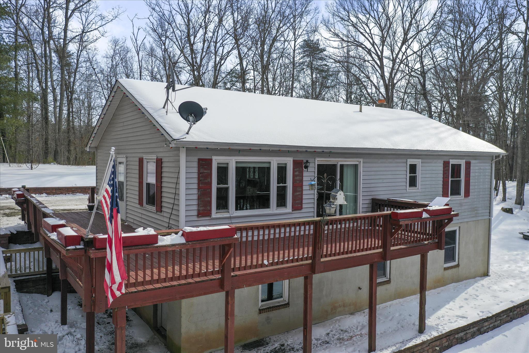 444 Castleton Ford Road Castleton, VA 22716 - Photo 64 of 64 a view of a house with a chairs and wooden fence