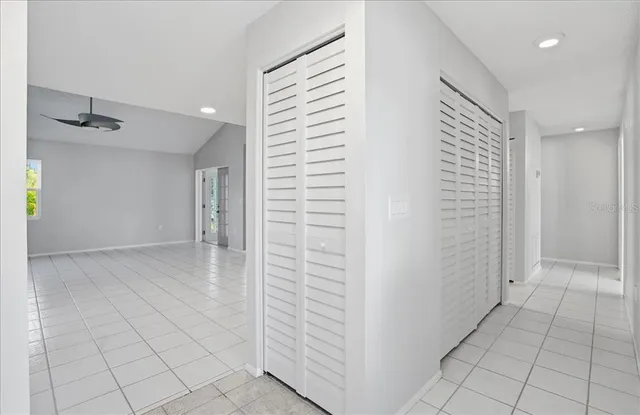 a view of a balcony with wooden floor