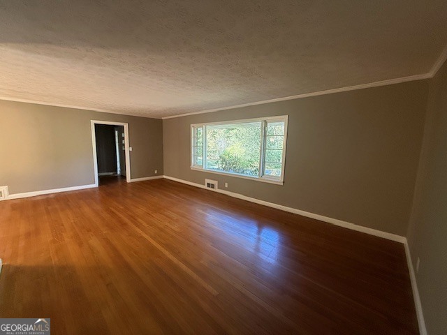 1397 Jewell Court Mableton, GA 30126 - Photo 14 of 27 an empty room with wooden floor and windows