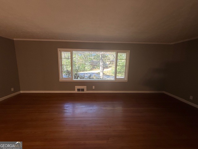 1397 Jewell Court Mableton, GA 30126 - Photo 17 of 27 an empty room with wooden floor and windows