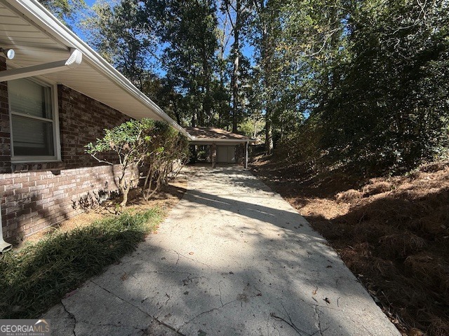 1397 Jewell Court Mableton, GA 30126 - Photo 21 of 27 a view of a yard with wooden fence
