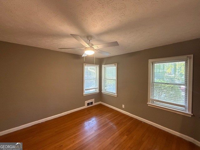 1397 Jewell Court Mableton, GA 30126 - Photo 3 of 27 an empty room with wooden floor and windows