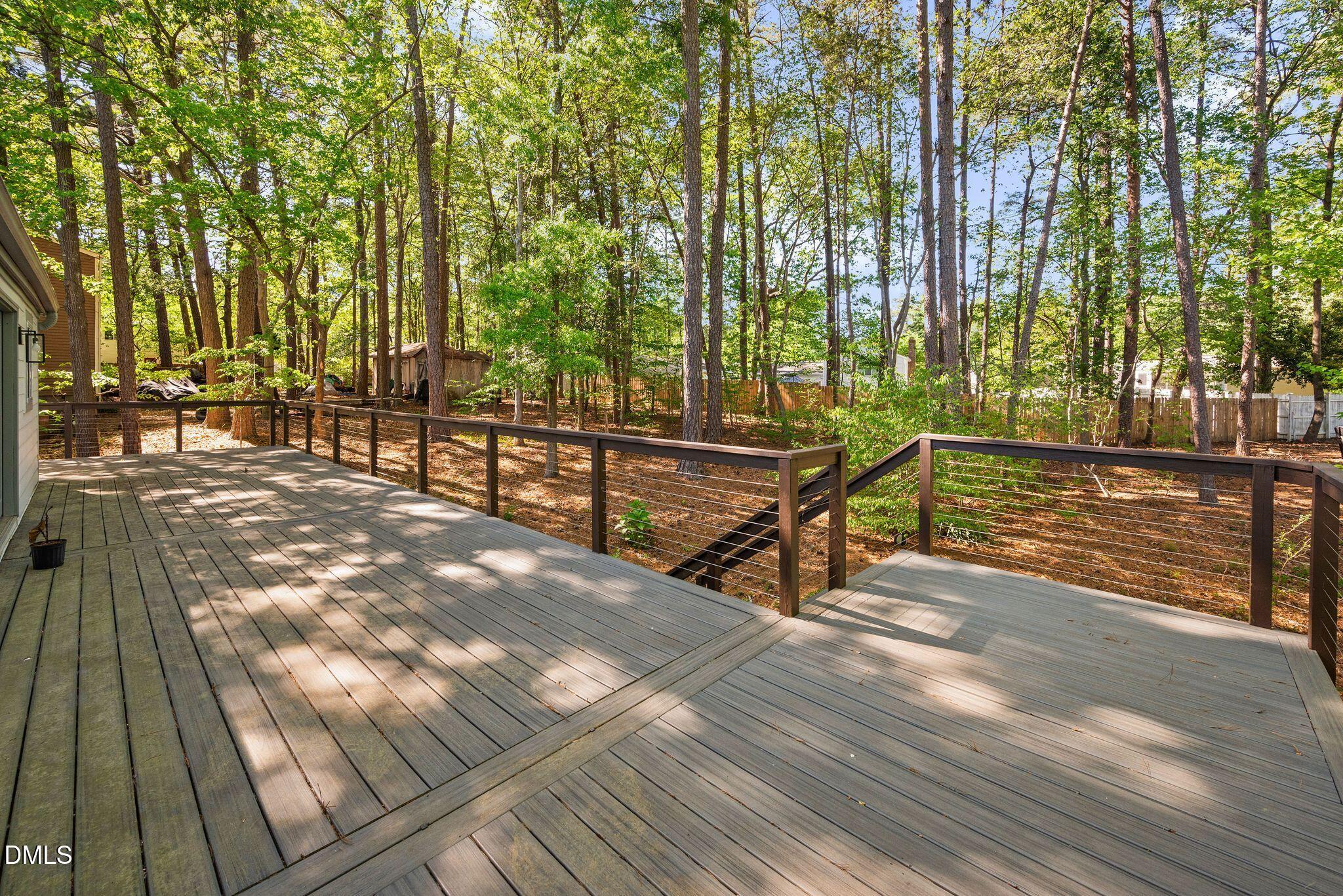 313 Crown Oaks Drive Raleigh, NC 27615 - Photo 35 of 60 a view of outdoor space with seating area