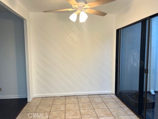 641 Buckboard Court Brea, CA 92821 - Photo 4 of 10 an empty room with windows and fan