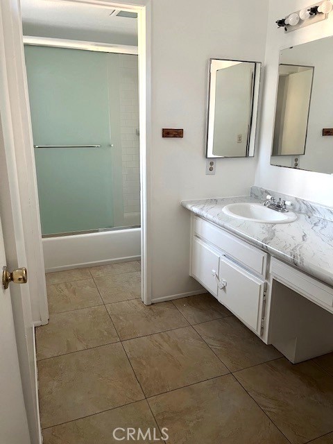 641 Buckboard Court Brea, CA 92821 - Photo 7 of 10 a bathroom with a sink a toilet and a mirror
