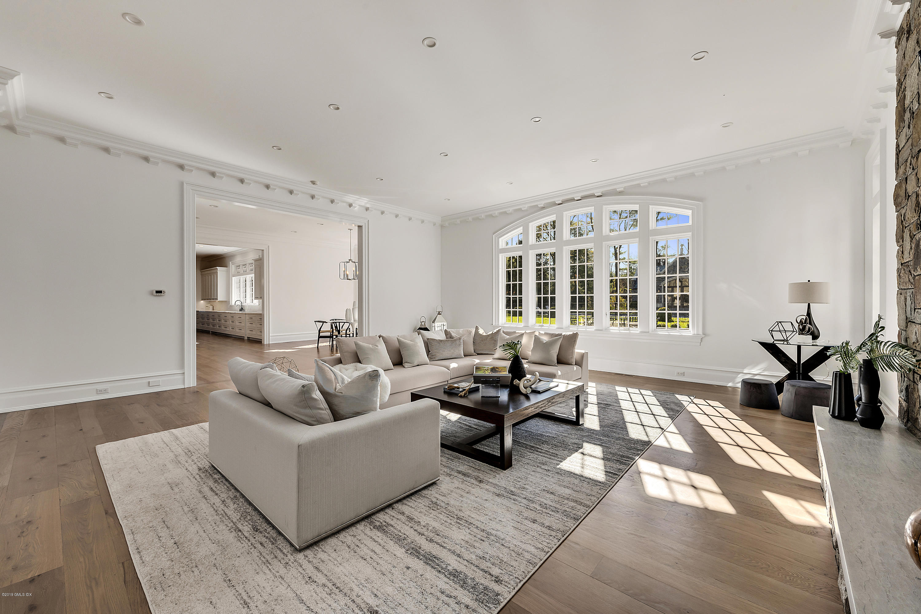 7 Loch Lane Greenwich, CT 06830 - Photo 17 of 41 a living room with furniture and a large window