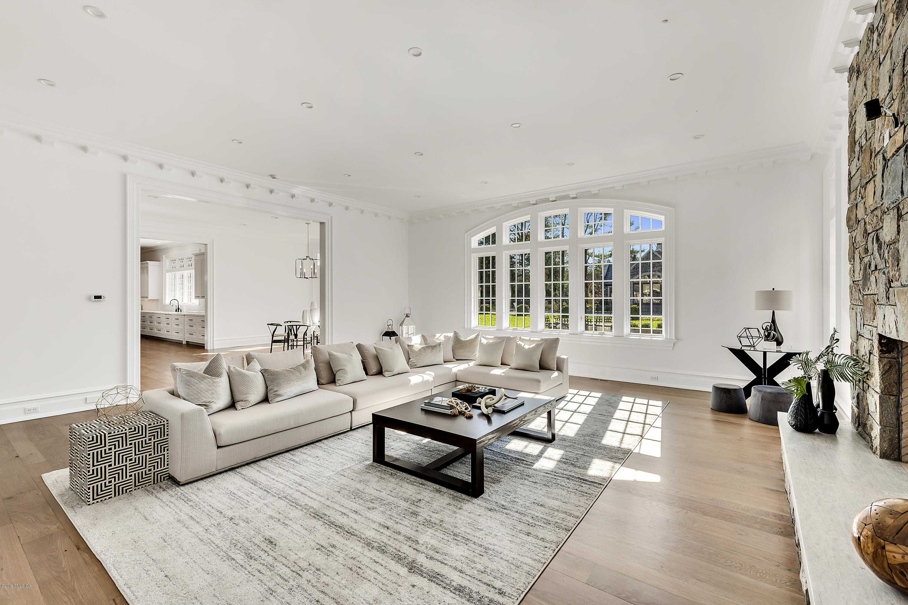 7 Loch Lane Greenwich, CT 06830 - Photo 19 of 41 a living room with furniture and wooden floor