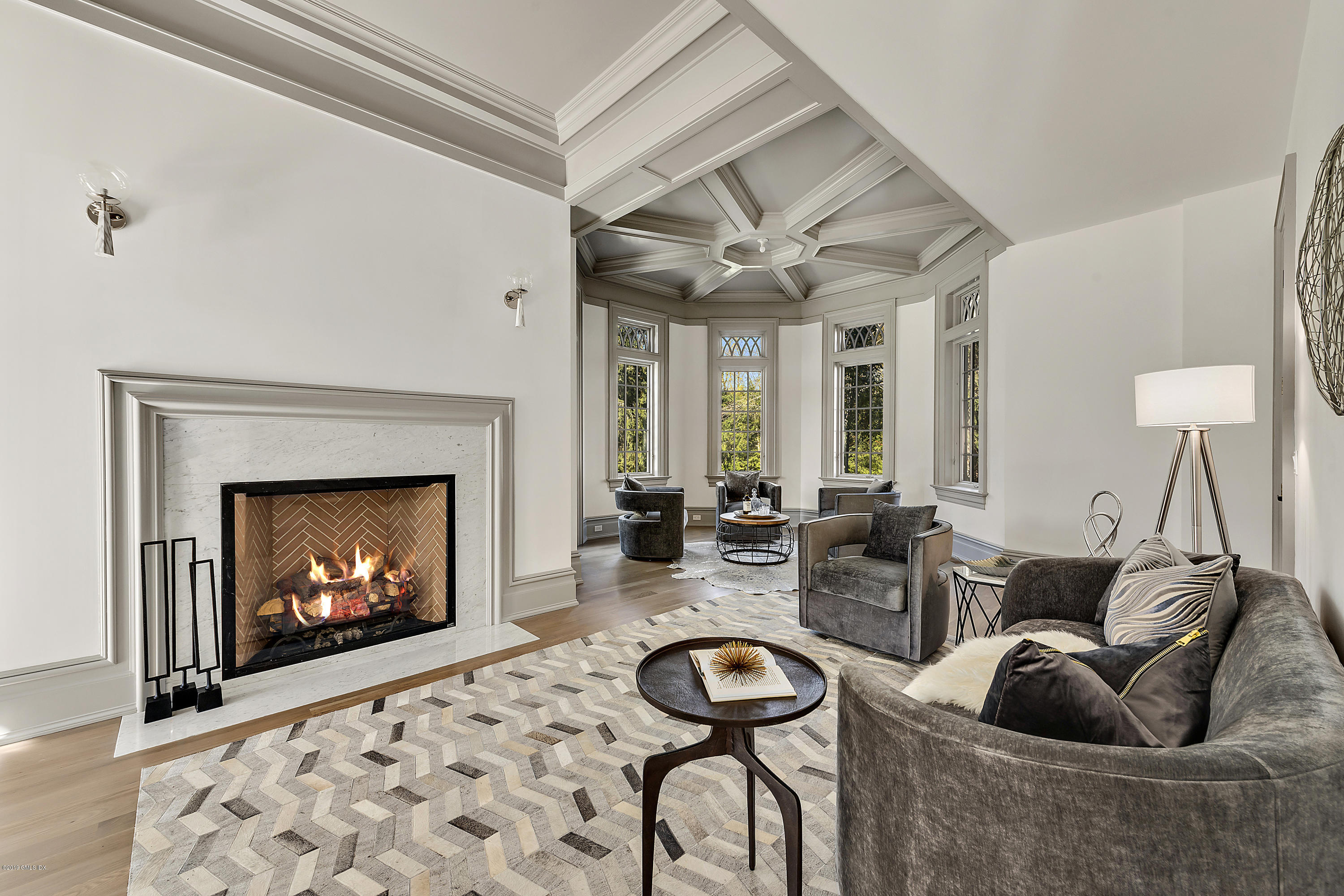 7 Loch Lane Greenwich, CT 06830 - Photo 20 of 41 a living room with furniture and a fireplace