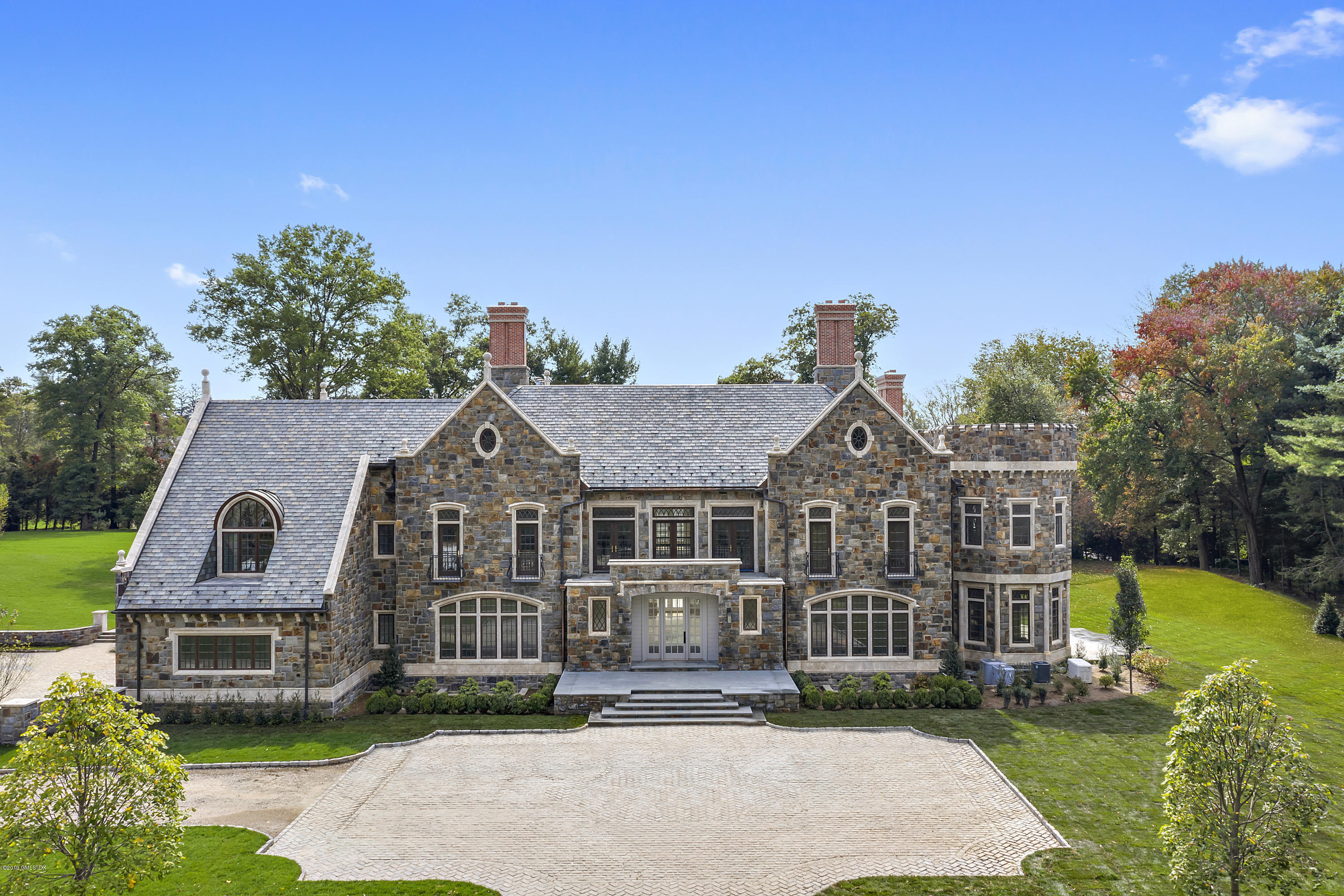 7 Loch Lane Greenwich, CT 06830 - Photo 2 of 41 a front view of a house with garden