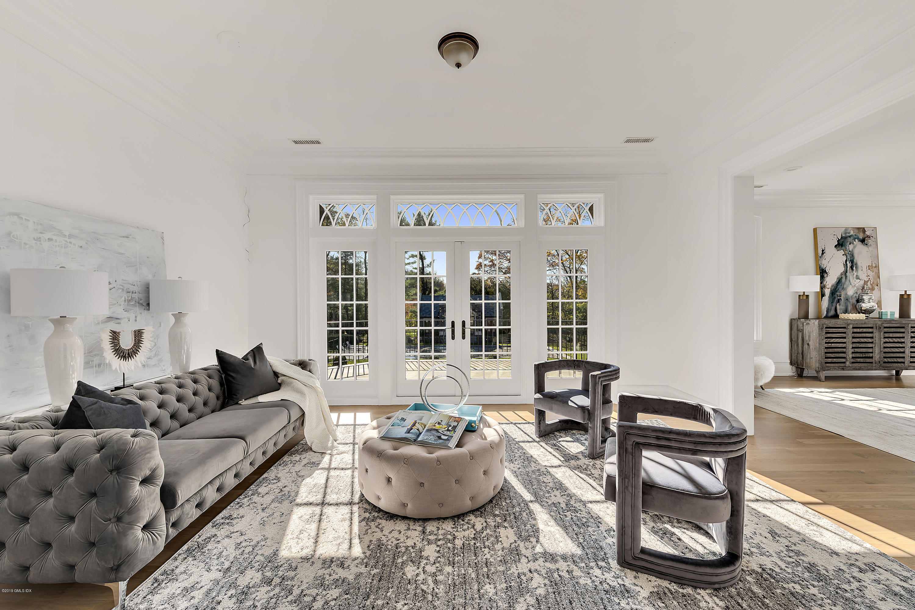 7 Loch Lane Greenwich, CT 06830 - Photo 29 of 41 a living room with furniture and a window
